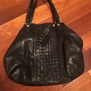 Coke Haan weaved and tassel classic black bag